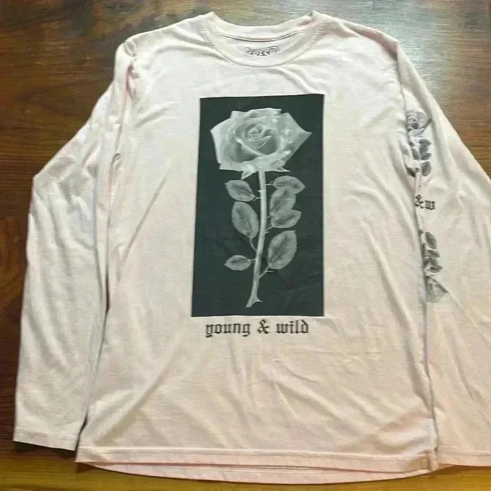 Fresh laundry women’s size medium pink young and wild long sleeve T-shirt.